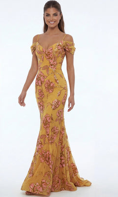 A woman wearing the Jovani 44652 long formal dress, a fitted, off-the-shoulder yellow gown adorned with pink floral patterns and sequins, stands against a plain white background.