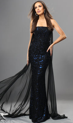 A woman wearing the Long Formal Dress: Jovani 45306 in black/blue, a fitted, floor-length sequin evening gown with black sheer drapes, poses against a plain gray background. This stunning designer formal dress truly captures the essence of elegance and sophistication.