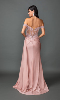 Woman modeling the Long Prom Dress: Dancing Queen 4535 in blush pink, with an off-the-shoulder design, floor-length skirt, and sheer lace embroidered back, posed against a gray background.