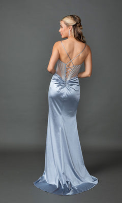 Woman in the Dancing Queen 4538 long prom dress, silver-blue satin with lace-up back and thin straps, stands facing away against a gray background.