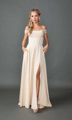 Model showcasing the Dancing Queen 4539, a long ivory A-line prom dress with an off-shoulder neckline and thigh-high leg slit, posing against a plain gray background.