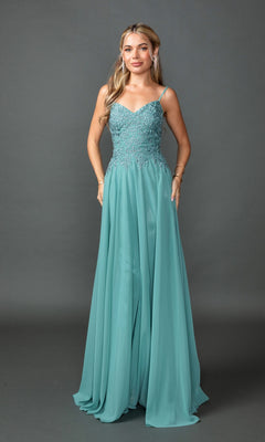 A woman stands against a gray background wearing the Dancing Queen 4542, a floor-length teal prom dress featuring spaghetti straps, a fitted lace embroidered bodice, and a flowing skirt.