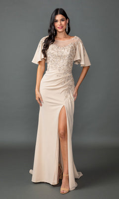 A woman wears the Dancing Queen 4549 long formal dress in champagne, featuring an embroidered bodice, beaded accents, flutter sleeves, and a front leg slit, standing against a plain gray background.