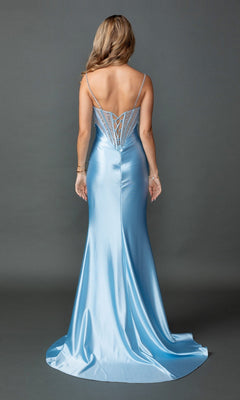 Wearing the Dancing Queen 4576 long prom dress, a woman stands with her back to the camera against a plain gray background. The shiny light blue gown features thin straps, a lace-up back detail, and a sheer corset bodice, extending elegantly to the floor.