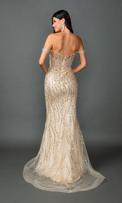 A woman wearing the Dancing Queen 4598 long prom dress stands facing away, showcasing its off-the-shoulder, floor-length silhouette with a sheer corset bodice, gold sequin embellishments, and decorative beading against a plain gray background.