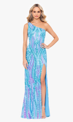 A woman models the Blondie Nites 4610BN long sequin-print prom dress, featuring blue and purple hues, a one-shoulder neckline, and a thigh-high slit, against a white background.