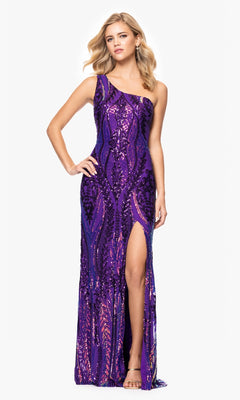 A woman poses with one hand on her hip in the Blondie Nites 4610BN Long Sequin-Print Prom Dress, a sleeveless floor-length gown featuring a thigh-high slit, set against a plain background.