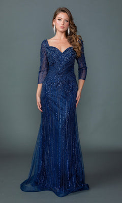 A woman stands against a plain gray background wearing the navy Long Formal Dress: Dancing Queen 4611, a floor-length gown with embellishments and three-quarter sleeves.