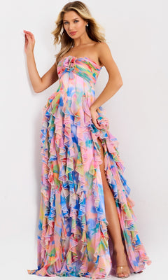 A woman models the Jovani 46381 long prom dress—a strapless chiffon gown featuring multicolored ruffles and a high slit—against a plain white background.