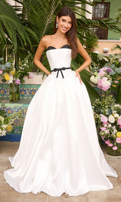 Ava Presley 47365 strapless ivory ball gown featuring a black sweetheart neckline and a black waist bow.