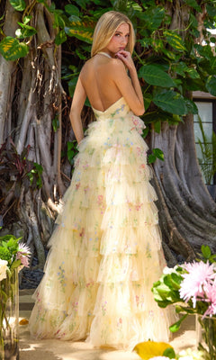 Long Prom Dress: Ava Presley 47413 in a yellow backless floral design with a tiered, ruffled skirt and colorful embroidery.