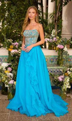 A woman wears a Long Prom Dress: Ava Presley 47420 strapless ball gown with a gold-beaded bodice and a long, bright blue ruffled skirt.