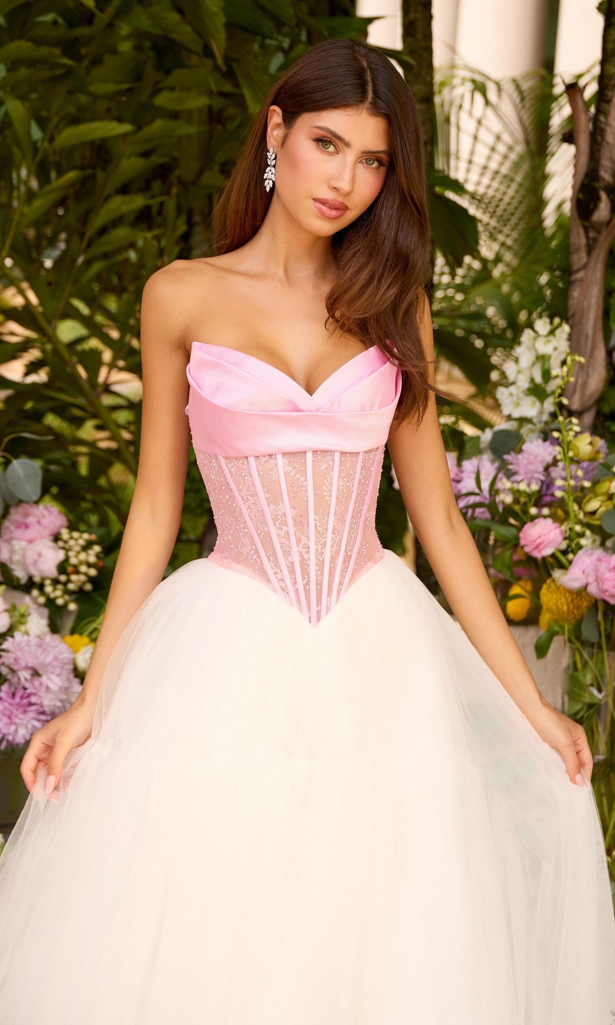 Ava Presley 47484 strapless ballgown featuring a pink satin sweetheart bodice, a sheer corset-style midsection with vertical boning, and a voluminous white tulle skirt.