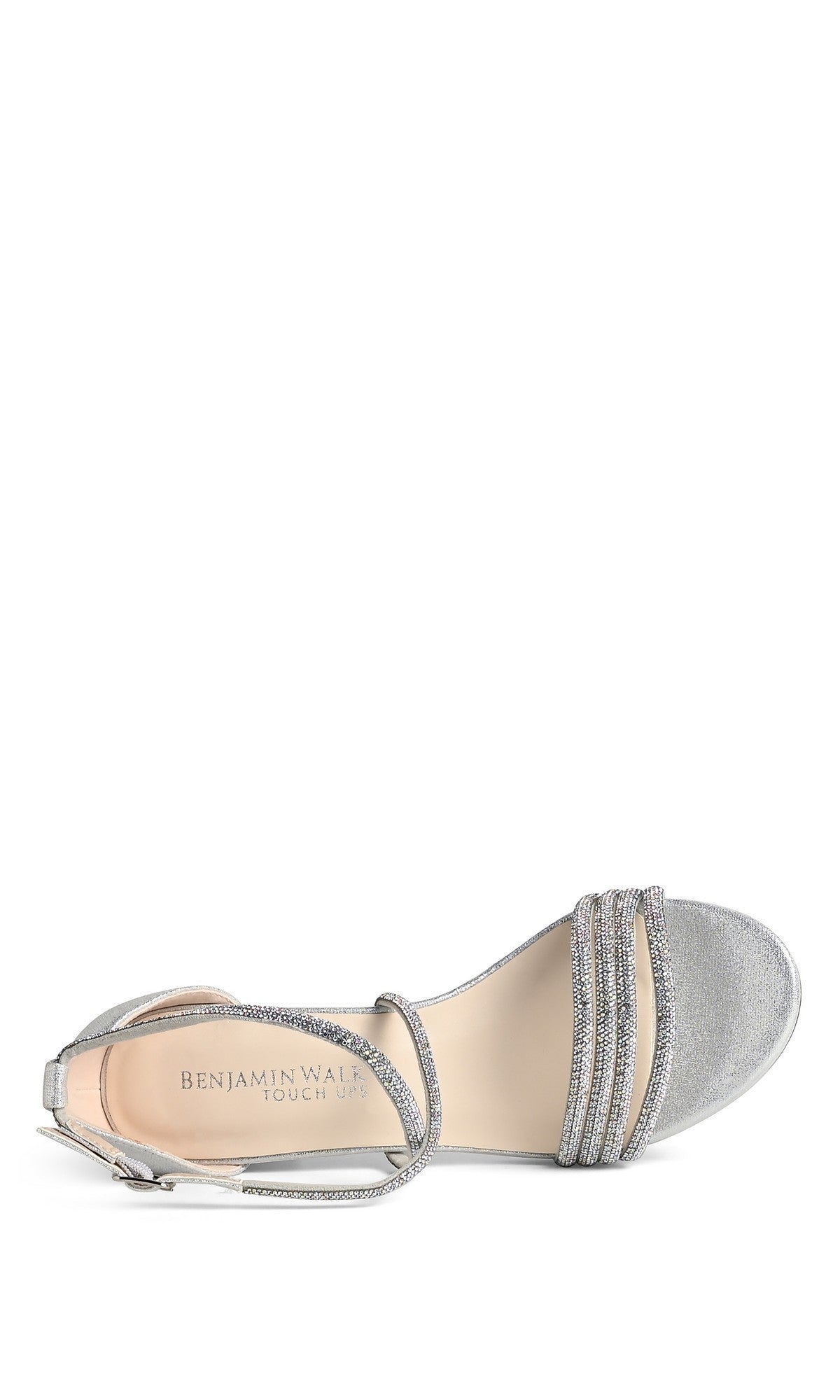 The Tabbie Silver Prom Shoes by Touch Ups (4778) feature an open toe, crystal-embellished straps, ankle strap, low block heel, decorative rhinestones on the toe strap, and visible brand name on the insole.