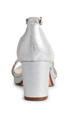A close-up rear view of the Tabbie Silver Prom Shoes (Touch Ups 4778), featuring block heels, crystal-embellished straps, an ankle strap, and a textured fabric finish.