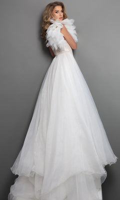 A woman poses against a gray background in the Jovani 47895 Long Formal Dress—a white, floor-length, sleeveless gown featuring a feathered accent around her shoulders.