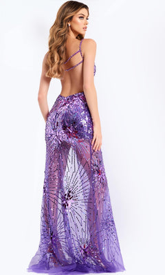 A woman with long wavy hair models the Jovani 48502, a sleeveless, backless long prom dress with a floor-length sheath skirt and sheer sequined floral pattern, standing against a plain background.