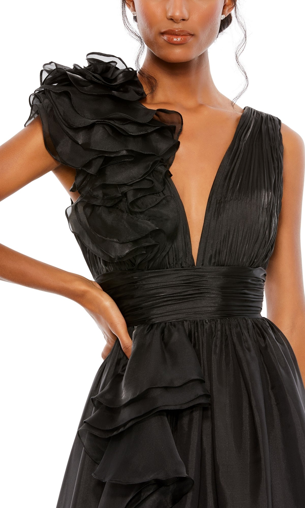 Woman in the Mac Duggal 48856 Ruffled Long Prom Ball Gown—a sleeveless black evening dress with a deep V-neck and ruffled accents on the shoulder and waist, perfect for special occasions.