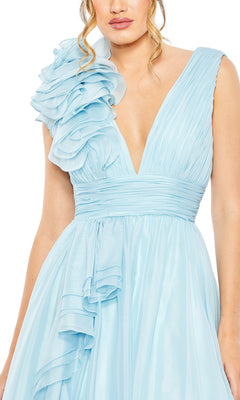 A woman wearing the Ruffled Long Prom Ball Gown: Mac Duggal 48856, a light blue sleeveless evening dress featuring a deep V-neck and ruffled detail on one shoulder.