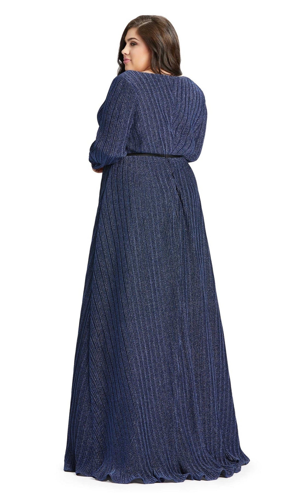 A woman faces away from the camera in a floor-length, dark blue pleated plus-size dress—Mac Duggal 48892.