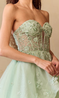 Light green strapless dress with floral lace details on a neutral background
