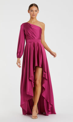 A woman models the Mac Duggal 49141 One-Sleeve High-Low Prom Dress in magenta, featuring a single long sleeve and an elegant high-low hem, standing against a plain background.