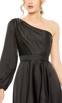 A woman models the Mac Duggal 49141 One-Sleeve High-Low Prom Dress, a chic black evening gown featuring a fitted waist and dramatic single long sleeve, shown from neck to waist.