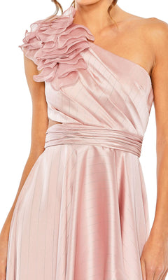 Woman wearing the Mac Duggal 49523 One-Shoulder Wedding Guest Dress, a light pink satin gown featuring a high-low hem, ruffles, and pleated waist detail.