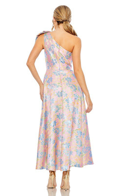 A woman stands facing away from the camera in the Mac Duggal Long Formal Dress 49623—a shiny, pink pastel one-shoulder gown with an A-line skirt—paired with nude heels.