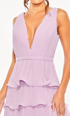 A woman wearing the Mac Duggal 49671 Midi Wedding Guest Dress, a light purple chiffon design featuring a sleeveless deep V-neckline and a layered ruffle skirt.