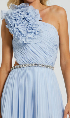 A woman wears the Mac Duggal Long Formal Dress 49687—an elegant powder blue one-shoulder A-line gown with pleats, a dramatic ruffle, and a sparkling beaded waist belt.