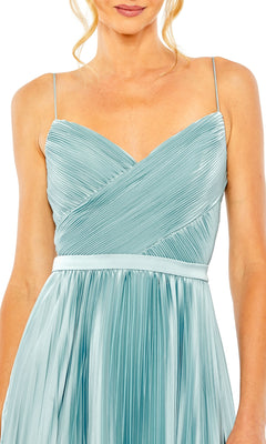 A woman wearing the Long Formal Dress 49715 by Mac Duggal, a French blue pleated sleeveless gown with thin straps and a V-neckline.