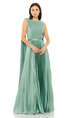 A woman models the Mac Duggal 49716, a sage green sleeveless formal dress with a fitted bodice and wide pleated floor-length skirt, standing against a white background.