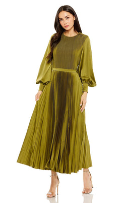 A woman stands against a white background wearing the Mac Duggal Tea Length Formal Dress 49718 in olive green, featuring long sleeves, a pleated A-line silhouette, fitted waist, and flowy skirt, paired with strappy nude heels.