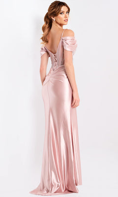 A woman poses against a plain white background wearing the Jovani 49719 long prom dress—an off-the-shoulder satin gown in blush pink, featuring a fitted corset bodice, sheath skirt, and lace-up back.