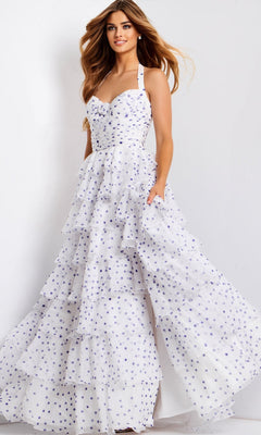 A woman stands in front of a plain background wearing the Jovani 49776 Long Prom Dress, a white floor-length gown with purple polka dots and a sweetheart halter neckline.