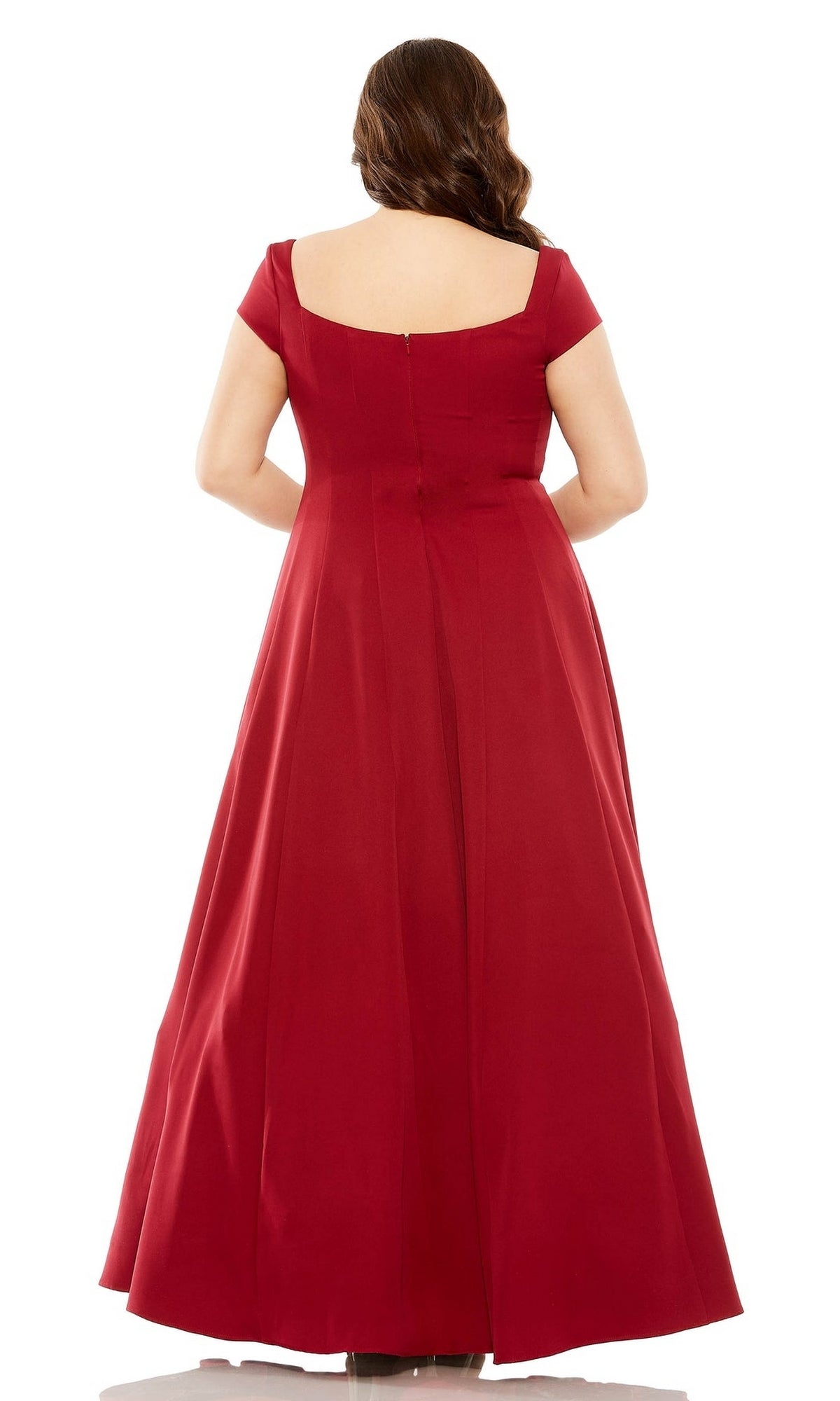 A woman is shown from the back wearing a floor-length, short-sleeve, red Mac Duggal Plus-Size Simple Long Formal Dress 49783W with a fitted bodice and flared skirt.
