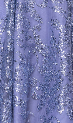 Close-up of the Mini Glitter Hoco Dress: Blondie Nites 5001BN-1, featuring lilac fabric adorned with intricate silver sequins and glitter for a shimmering, textured look—perfect for a sparkling junior party or cocktail dress.