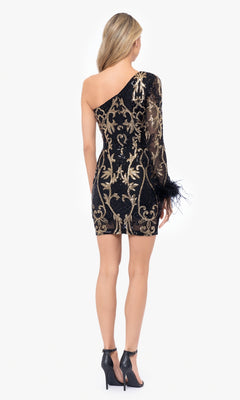 A woman stands with her back to the camera, wearing the One-Sleeve Short Black and Gold Hoco Dress 5013BN, a junior-size party dress featuring striking gold detailing and paired with black high heels.