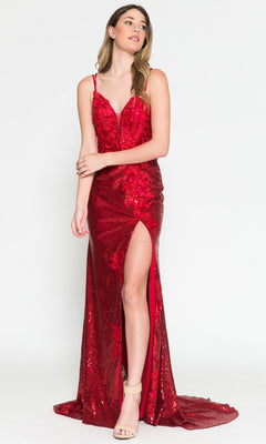 Woman in a Floral-Embellished Long Sequin Prom Dress 5020—floor-length, red with thigh-high slit, thin straps, open back, and beige high-heeled sandals—stands against a plain white background.