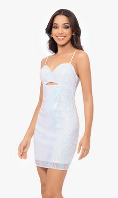 Woman wearing the Cut-Out Short White Sequin Homecoming Dress 5038BN, a fitted dress with thin straps, iridescent sequins, and a small cutout below the bust, standing and smiling against a plain background.