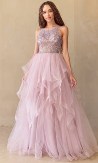 Woman wearing a rose pink glitter tulle prom ball gown with a beaded bodice against a beige background