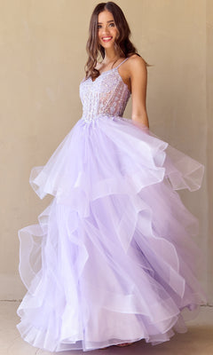 A woman models the Long Glitter Prom Ball Gown: Amelia Couture 5068, featuring a sleeveless lavender beaded bodice and layered tulle skirt, standing before a plain beige background.