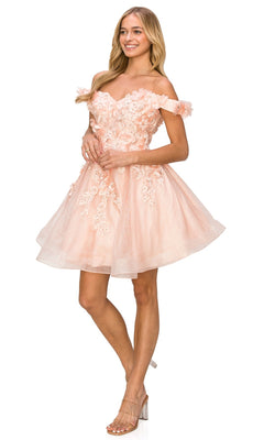A woman in the Shimmer Off-Shoulder Short Homecoming Dress 5120J—a light pink, floral-detailed, sheer-layered baby doll party dress—styled with nude heeled sandals.