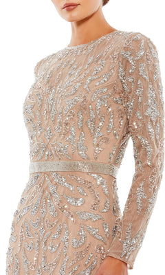 A woman wearing the Mac Duggal 5124 Long Sleeve Sequin Formal Dress—a nude dress with intricate silver sequin and bead embellishments in swirling patterns.