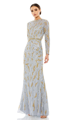 A woman stands against a white background wearing the Mac Duggal 5124 Long Sleeve Sequin Formal Dress, featuring light blue fabric, gold embroidery, long sleeves, and a fitted waist.