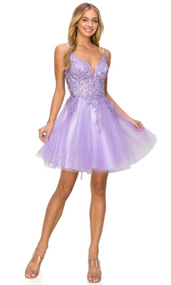 A woman stands smiling in the Corset-Back Short Glitter Homecoming Dress 5125J, a lavender sleeveless semi-formal dress with a fitted bodice, floral details, and a tulle skirt.