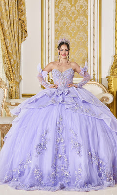 A young woman wears a lilac Quinceanera Dress 5129 By Dancing Queen featuring a beaded corset bodice, floral embroidery, sheer sleeves, and a tiara.