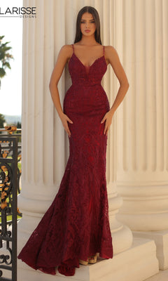 A woman stands before white columns wearing a fitted wine Long Prom Dress, Clarisse Designs 5138, featuring lace, thin straps, and a floor-length hem.