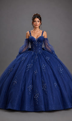A woman wearing the Quinceanera Dress 5177 by Dancing Queen in navy, featuring a corset bodice, beaded details, tulle sleeves, and floral embroidery, stands against a plain gray background.